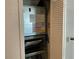A utility closet with a newer HVAC unit and clean air filter at 586 Brantley Terrace Way # 201, Altamonte Springs, FL 32714