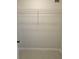 A walk-in closet with a wire shelf at 703 Pine Shores Cir, New Smyrna Beach, FL 32168