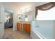 Bathroom boasts a bathtub and double vanity with tile flooring at 8095 Indian Creek Blvd, Kissimmee, FL 34747