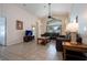 Inviting living room with high ceilings, ceiling fan, and comfortable furniture at 8095 Indian Creek Blvd, Kissimmee, FL 34747