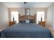 Spacious main bedroom with king bed, and matching nightstands, offering a peaceful retreat at 8095 Indian Creek Blvd, Kissimmee, FL 34747