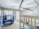 Spacious bedroom featuring carpeted flooring and a bunk bed frame at 976 E Michigan St # A, Orlando, FL 32806