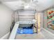 Bright bedroom featuring carpeted flooring and a bunk bed with slide at 976 E Michigan St # A, Orlando, FL 32806