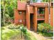 Charming two-story condo with well-maintained landscaping and inviting entryway at 976 E Michigan St # A, Orlando, FL 32806