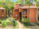 Charming two-story condo with well-maintained landscaping and inviting entryway at 976 E Michigan St # A, Orlando, FL 32806