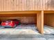 Carport parking area showcasing a red car at 976 E Michigan St # A, Orlando, FL 32806