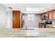 Kitchen features stainless steel appliances, granite countertops, and a view of the window at 976 E Michigan St # A, Orlando, FL 32806
