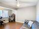 Bright living room featuring wood-style flooring and an inviting seating area at 976 E Michigan St # A, Orlando, FL 32806