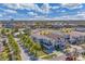 Aerial view of a neighborhood with well-maintained landscaping, luxury homes, and community features at 985 Jack Nicklaus Ct, Kissimmee, FL 34747