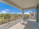 Relaxing balcony featuring great views, luxury railings and comfortable outdoor seating at 985 Jack Nicklaus Ct, Kissimmee, FL 34747