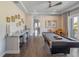 Game room featuring a pool table, bar seating, and hardwood floors at 985 Jack Nicklaus Ct, Kissimmee, FL 34747