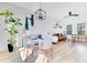 Dining area featuring modern decor, lots of natural light and light wood floors at 10226 Vickers Ridge Dr, Orlando, FL 32829