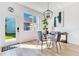 Dining area featuring modern decor, lots of natural light and light wood floors at 10226 Vickers Ridge Dr, Orlando, FL 32829