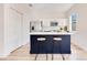 Bright kitchen with island seating, stainless steel refrigerator, and stylish backsplash at 10226 Vickers Ridge Dr, Orlando, FL 32829