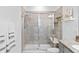 Modern bathroom featuring a glass-enclosed shower with built-in bench at 10358 Spring Arbor Ln, Winter Garden, FL 34787