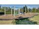 A community playground featuring climbing structures, swings, and safe play surfaces at 10358 Spring Arbor Ln, Winter Garden, FL 34787