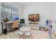 Bright and airy playroom with desk, TV, storage and beautiful natural light at 10358 Spring Arbor Ln, Winter Garden, FL 34787