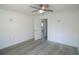 Spacious bedroom with new hard wood flooring and a ceiling fan at 1041 Vihlen Rd, Sanford, FL 32771