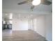 Bright open concept living room with stainless appliances in view of kitchen at 1041 Vihlen Rd, Sanford, FL 32771