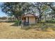 A small home with a front porch and a ramp to the front door at 1213 Cr 652, Bushnell, FL 33513