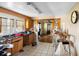 A kitchen featuring a window over the sink and an eat-in table set adjacent to the counterspace at 1213 Cr 652, Bushnell, FL 33513