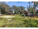 Exterior view of 2 sheds with a utility box in the foreground at 1213 Cr 652, Bushnell, FL 33513