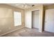 Bedroom includes ceiling fan and closet at 13812 Cepheus Dr, Orlando, FL 32828