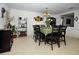 Dining area has an elegant chandelier and decor that complements a cozy space at 13812 Cepheus Dr, Orlando, FL 32828