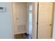 Hallway showing doors and thermostat at 13812 Cepheus Dr, Orlando, FL 32828