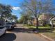 Serene street view showcases mature trees and well-maintained homes in a welcoming neighborhood at 13812 Cepheus Dr, Orlando, FL 32828