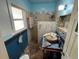 Unique bathroom with wood-style walk-in shower and stone flooring at 22 Poinsettia Dr, Deland, FL 32724
