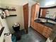 Unique bathroom featuring a vessel sink, custom cabinetry, and modern toilet at 22 Poinsettia Dr, Deland, FL 32724