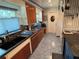 Well-appointed kitchen featuring classic cabinetry, updated appliances, and a functional layout for cooking and entertaining at 22 Poinsettia Dr, Deland, FL 32724