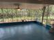 Enjoy outdoor living on the screened porch with views of the yard at 22 Poinsettia Dr, Deland, FL 32724