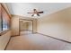 Bedroom with a ceiling fan, neutral walls, and mirrored closet doors at 229 Springside Rd, Longwood, FL 32779