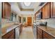 Kitchen with stainless steel appliances and granite countertops at 229 Springside Rd, Longwood, FL 32779