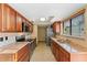 Kitchen featuring stainless steel appliances and granite countertops at 229 Springside Rd, Longwood, FL 32779