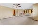 Comfortable living room featuring neutral tones, a ceiling fan and a fireplace at 229 Springside Rd, Longwood, FL 32779