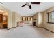 Bright living room with fireplace, ceiling fan and carpet at 229 Springside Rd, Longwood, FL 32779