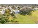 Aerial view of a home featuring a sprawling yard with mature trees at 250 Domino Dr, Orlando, FL 32805