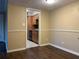 View of the dining room and open kitchen with wooden cabinets at 285 Wymore Rd # 204, Altamonte Springs, FL 32714