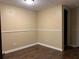 Interior room features modern base trim and dark laminate flooring at 285 Wymore Rd # 204, Altamonte Springs, FL 32714