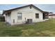 Exterior view of the back of the house featuring the air conditioning unit at 2903 Clear Way, Orlando, FL 32805