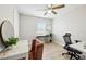 Well-lit bedroom featuring a makeup vanity, desk, and ample space at 304 Dover St, Orlando, FL 32811