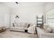 Inviting living room with comfortable seating, shelving, and natural light at 304 Dover St, Orlando, FL 32811