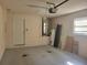 Interior of a garage featuring a water heater and door to the house at 3567 Capland Ave, Clermont, FL 34711