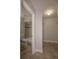 Bathroom featuring tiled shower/tub and an adjacent empty closet space at 385 Wymore Rd # 200, Altamonte Springs, FL 32714