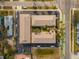 Aerial view of the building with a well-maintained parking lot and surrounding neighborhood streets at 400 Oakridge Blvd # 5, Daytona Beach, FL 32118