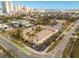 An aerial view of a condo complex with a view of the beach and cityscape in the background at 400 Oakridge Blvd # 5, Daytona Beach, FL 32118