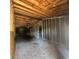 View of the interior of a house with exposed beams, studs, and plywood floors at 4384 Frances Ave, Sanford, FL 32773